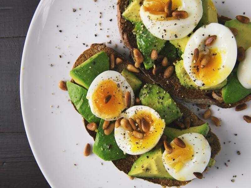 Pastry and boiled Egg on Plate